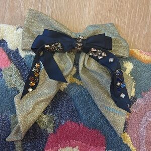 Large metallic sparkle bow hair clip